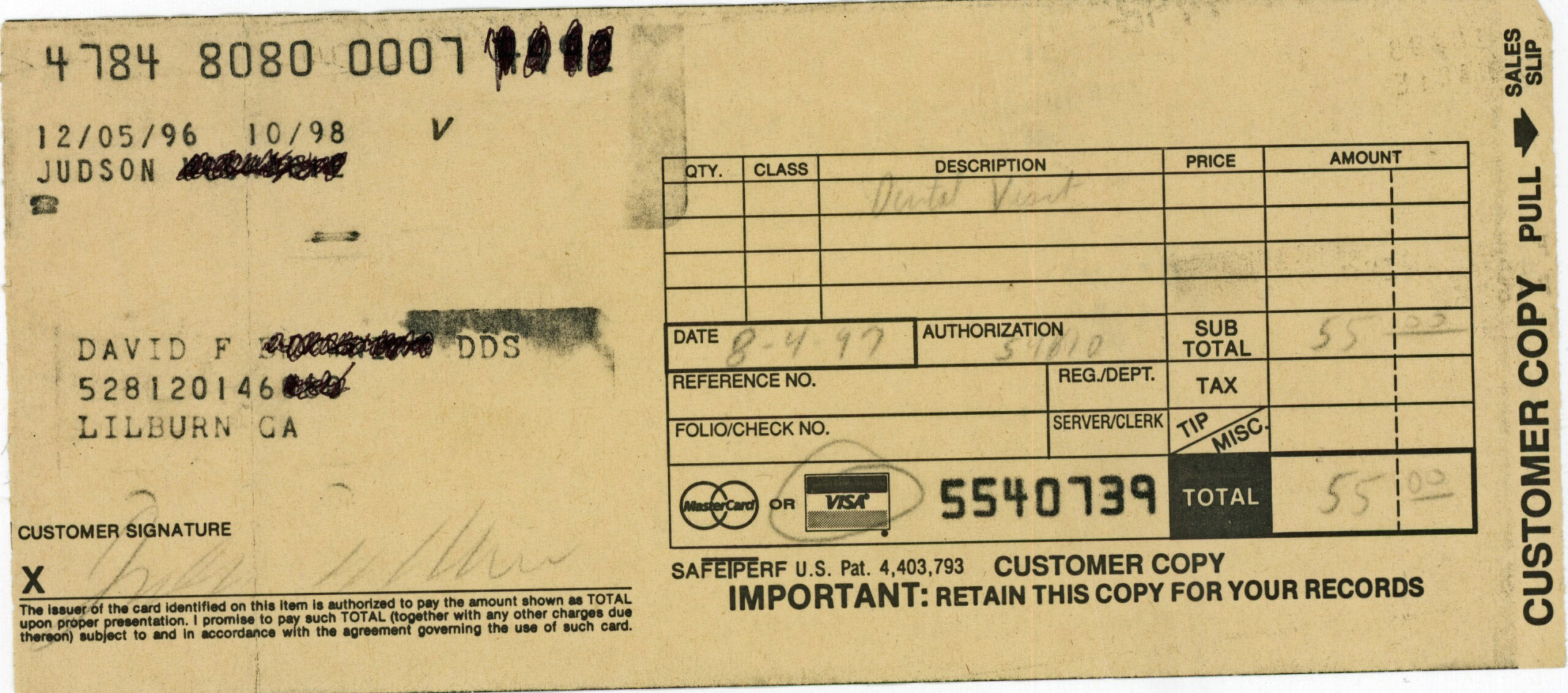 Credit card receipt representing minimum payment and card balance decisions